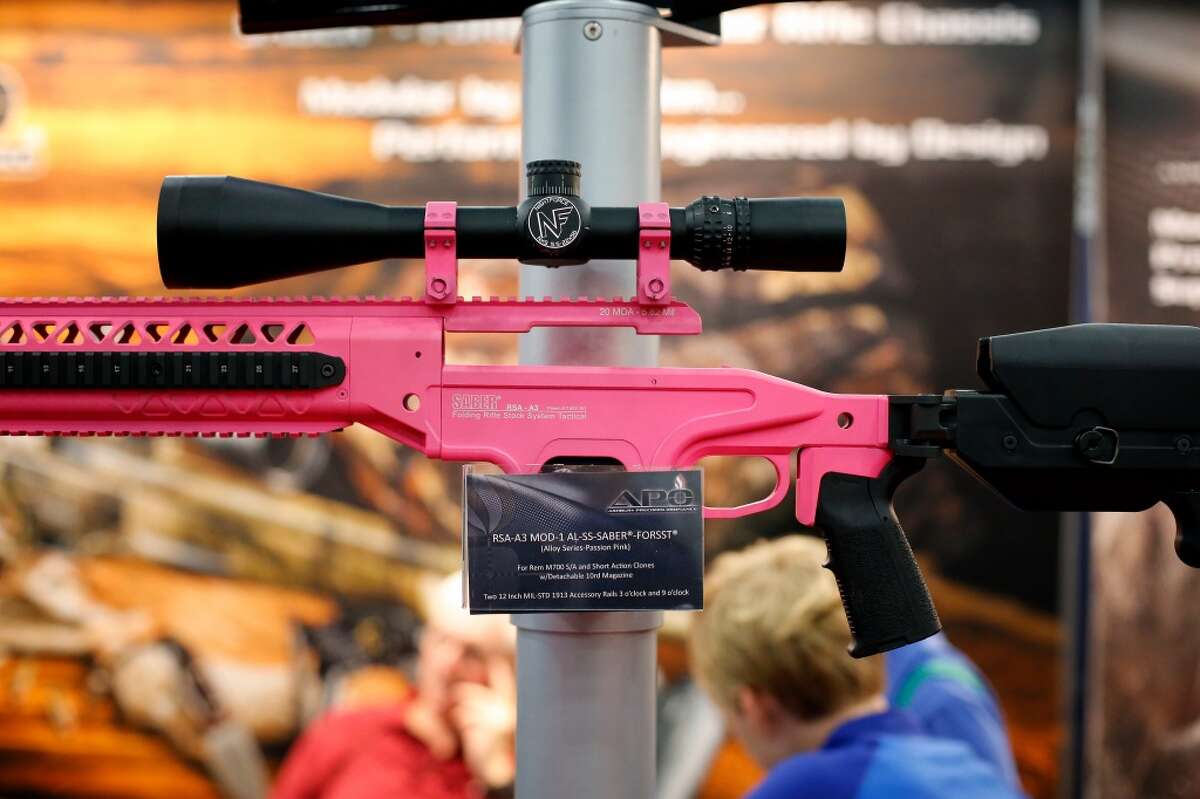 2. Are you currently charged with a crime that could land you in jail for more than a year? A decorative rifle is seen, during a 2013 NRA meeting in Houston at the George R Brown convention center. (TODD SPOTH FOR THE CHRONICLE)