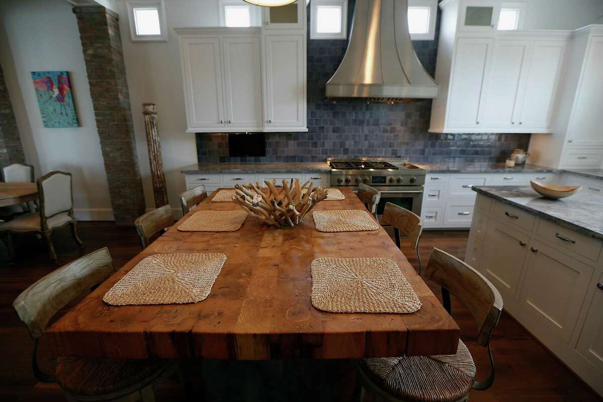 The butcher block table in the kitchen was a gift from the flooring expert who installed all the hardwoods in the home. ( James Nielsen / Houston Chronicle )