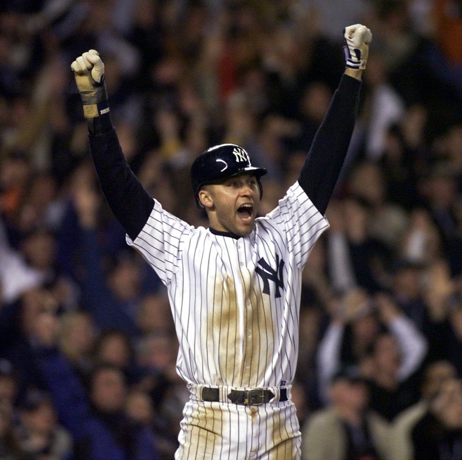 FILE ** New York Yankee legend Phil Rizzuto waves to fans at Old