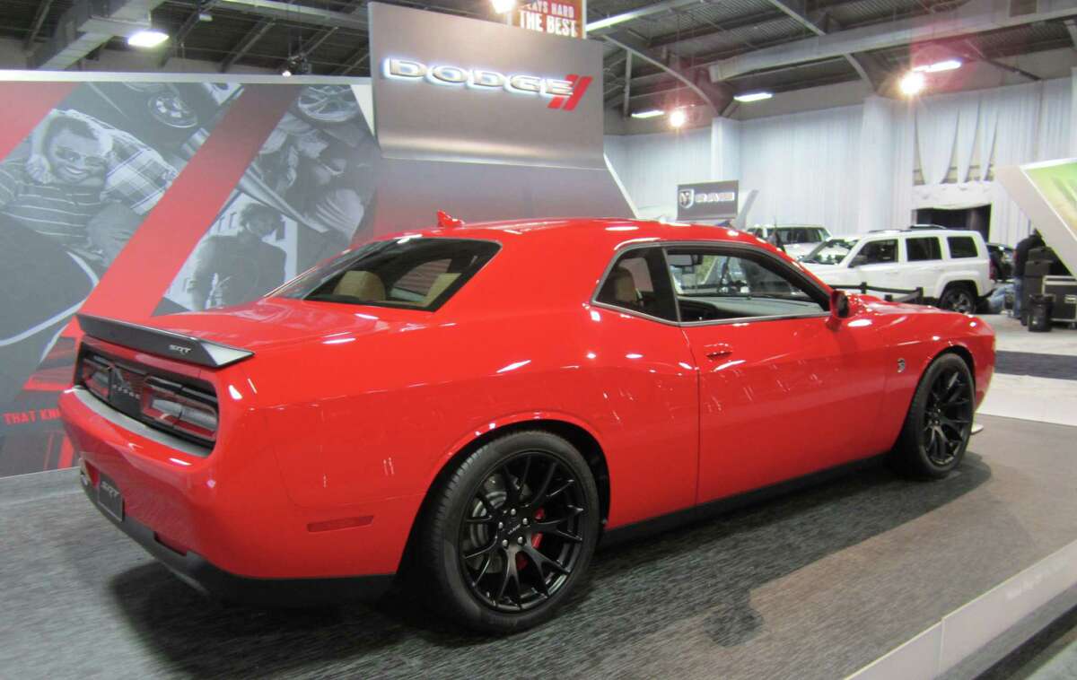 Dodge, which debuted the Challenger SRT Hellcat earlier this year, showcases the 707-horsepower muscle car at this year's State Fair of Texas auto show.