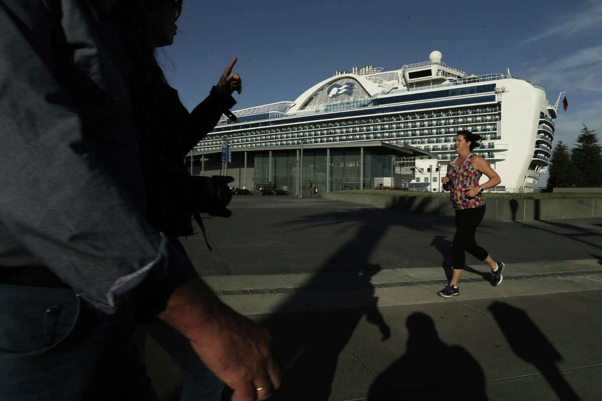 People walk and jog along the Embarcadero in front of the new Pier 27 terminal in San Francisco, Calif., on Monday, September 22, 2014. The new terminal will be inaugurated on Thursday, but has already had several large cruise ships dock in the past few weeks, the new cruise terminal at Pier 27 has reshaped the Embarcadero by adding another activity center while strengthening the traditional maritime uses.
