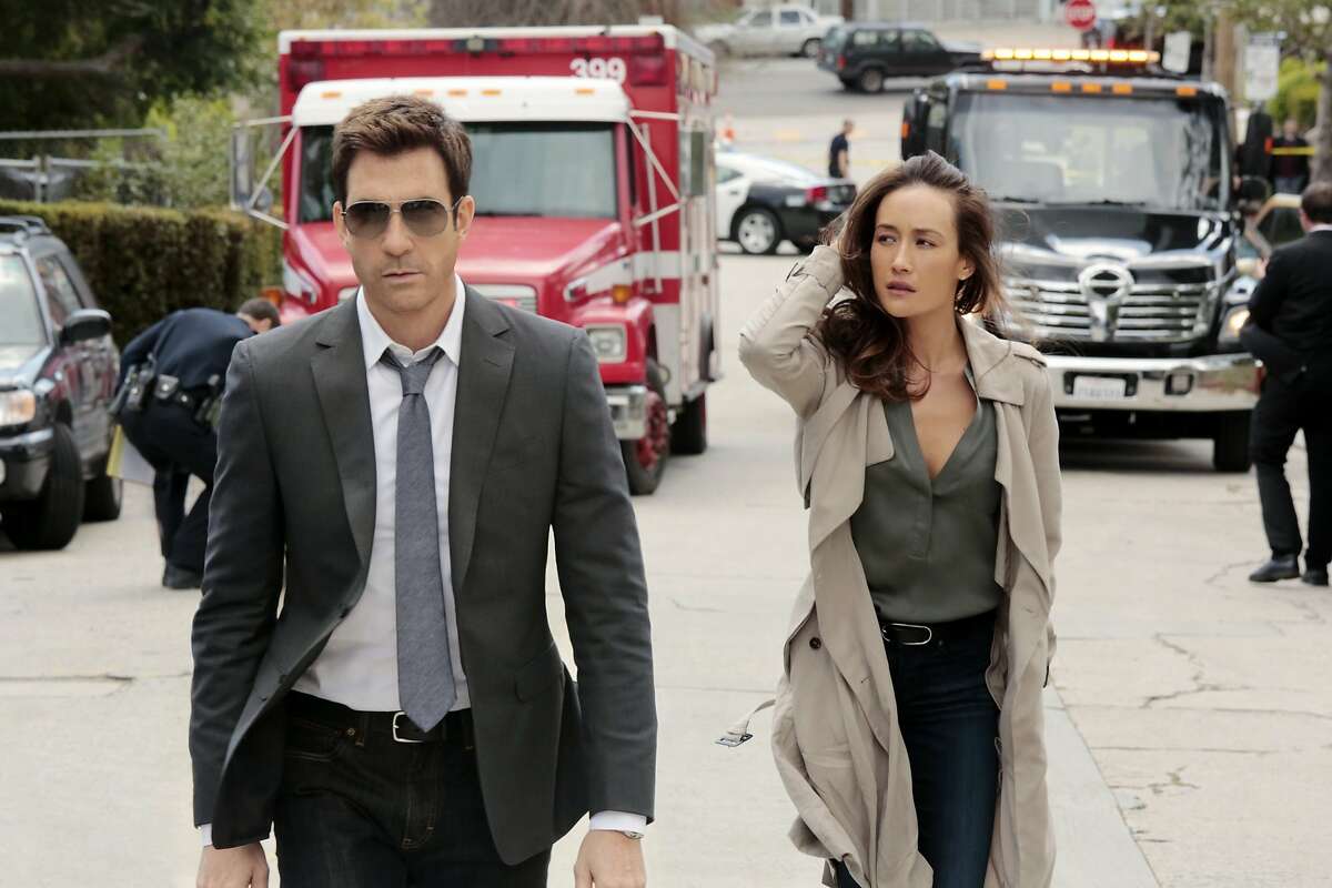 This image released by CBS shows Dylan McDermott, left, and Maggie Q in psychological thriller "Stalker," premiering Oct. 1. (AP Photo/CBS, Richard Cartwright)