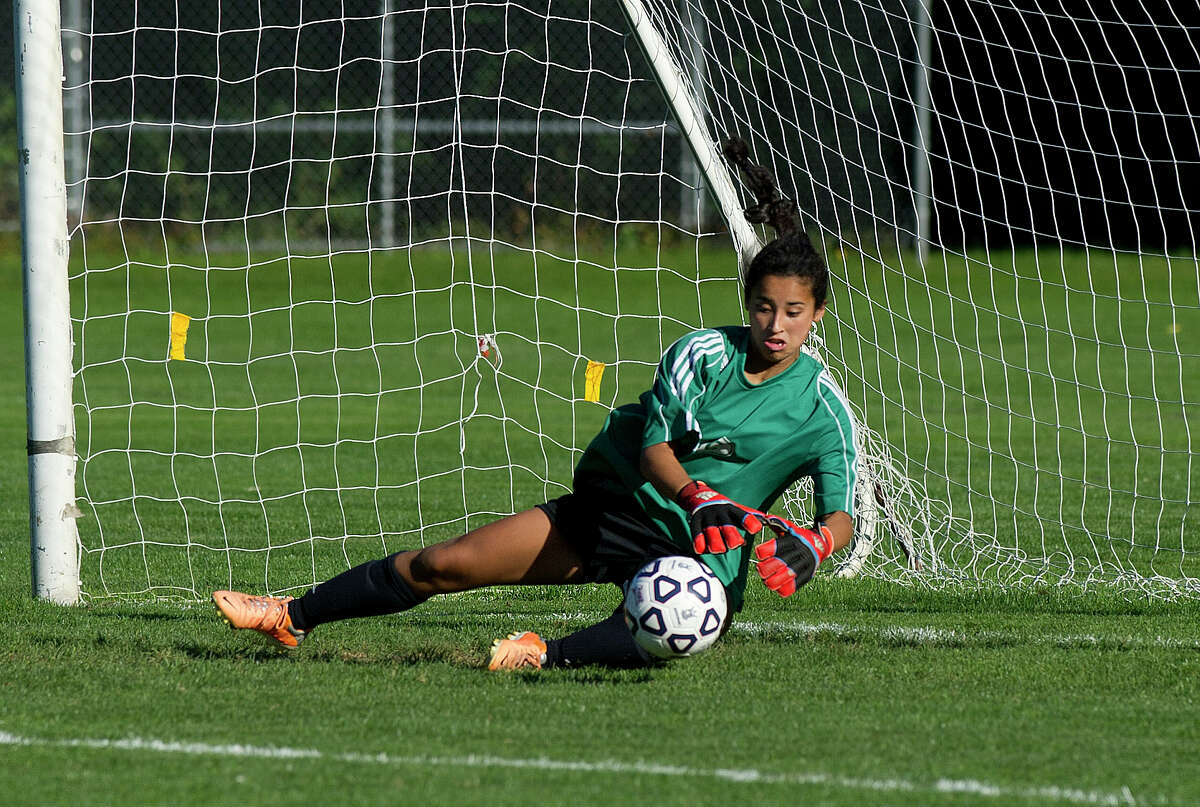 New Canaan's Katie Donovan makes a save during Friday's girls soccer game in New Canaan, Conn., on September 26, 2014.