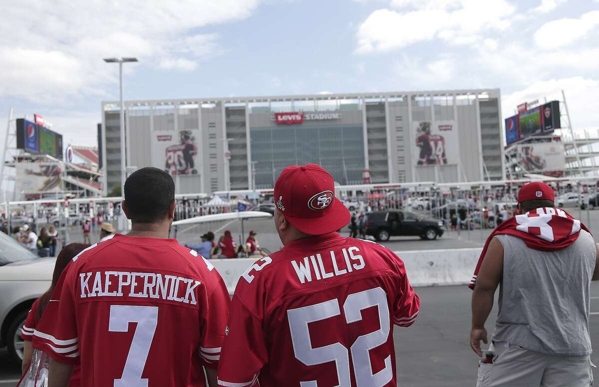 Fans walk outside of Levi's Stadium before an NFL football game between the San Francisco 49ers and the Philadelphia Eagles in Santa Clara.