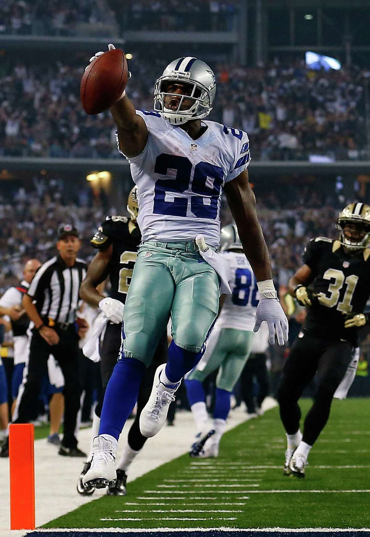 DeMarco Murray, the NFL's leading rusher, rushed for 149 yards and scored two touchdowns against the Saints.