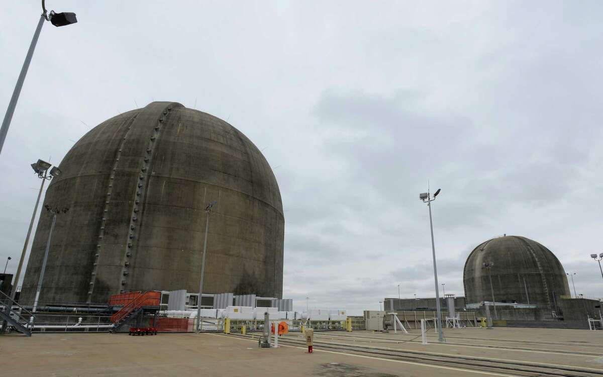 Reactive domes of the South Texas Project nuclear power plant sit under an overcast sky on Friday, Dec. 6, 2013.