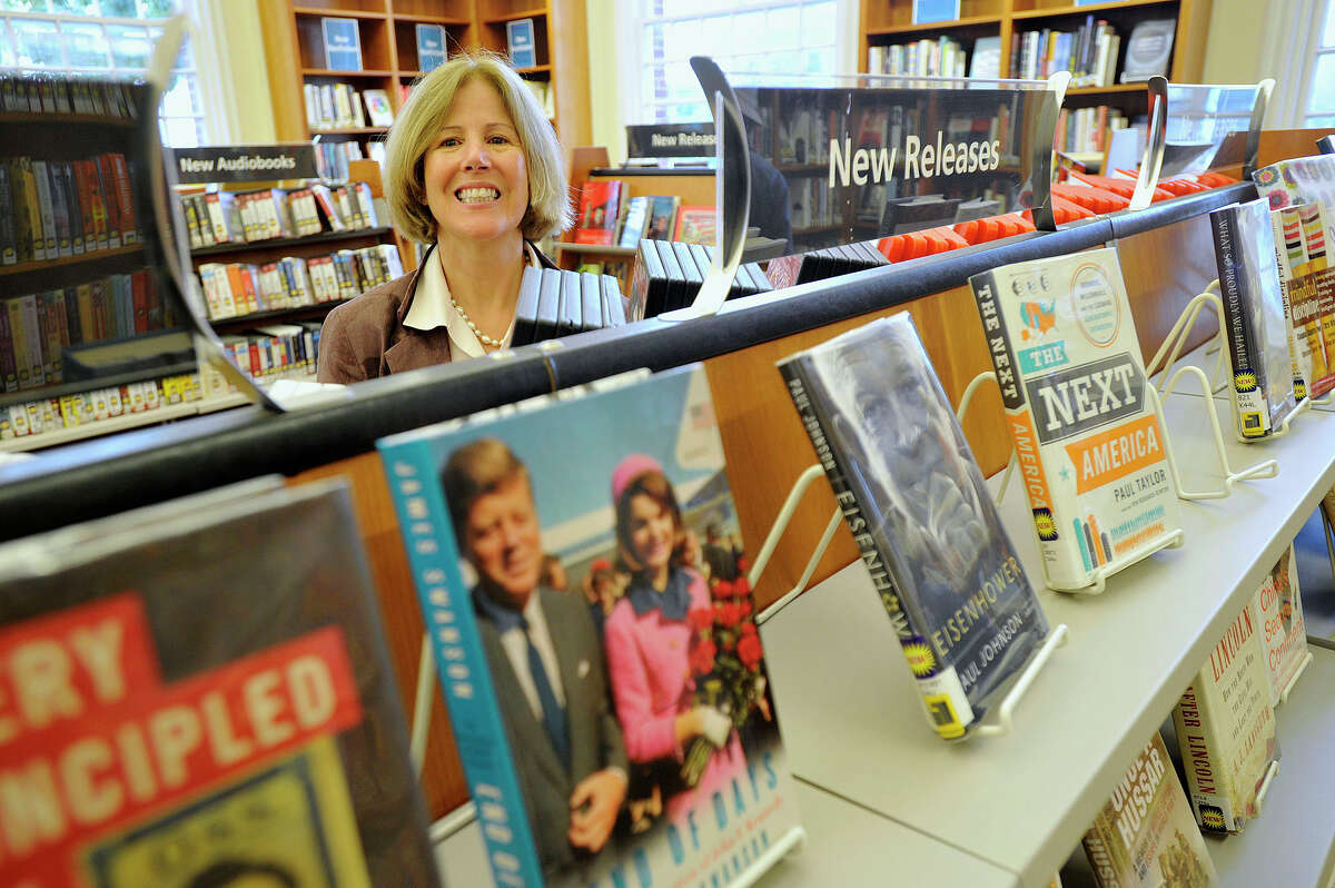 Alice Knapp poses for a photograph in the Ferguson Library in Stamford, Conn., on Tuesday, Sept. 30, 2014. Knapp is the new president of the library after serving as the library's director of user services and as the director of public services before that. She has worked at the library for nine and one-half years punctuated by a stint as the executive director of the New Canaan library. She took over the role as president of the library on Sept. 23.
