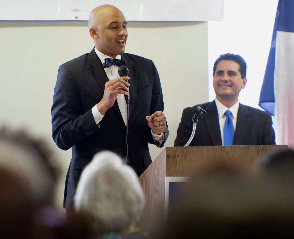 City Council District 2 candidate Alan Warrick II, left, speaks as Bexar County Democratic Party chairman Manuel Medina looks on, during a candidate forum, Saturday, Sept. 27, 2014, at Second Baptist Church in San Antonio. (Darren Abate/For the Express-News)