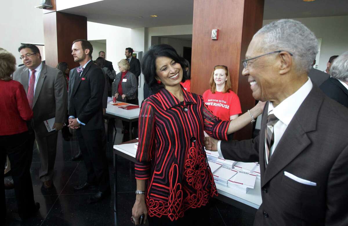 Renu Khator, president of the University of Houston, left, visits with Rev. William Lawson﻿ after the annual State of the University at﻿ Moores Opera House Wednesday.﻿