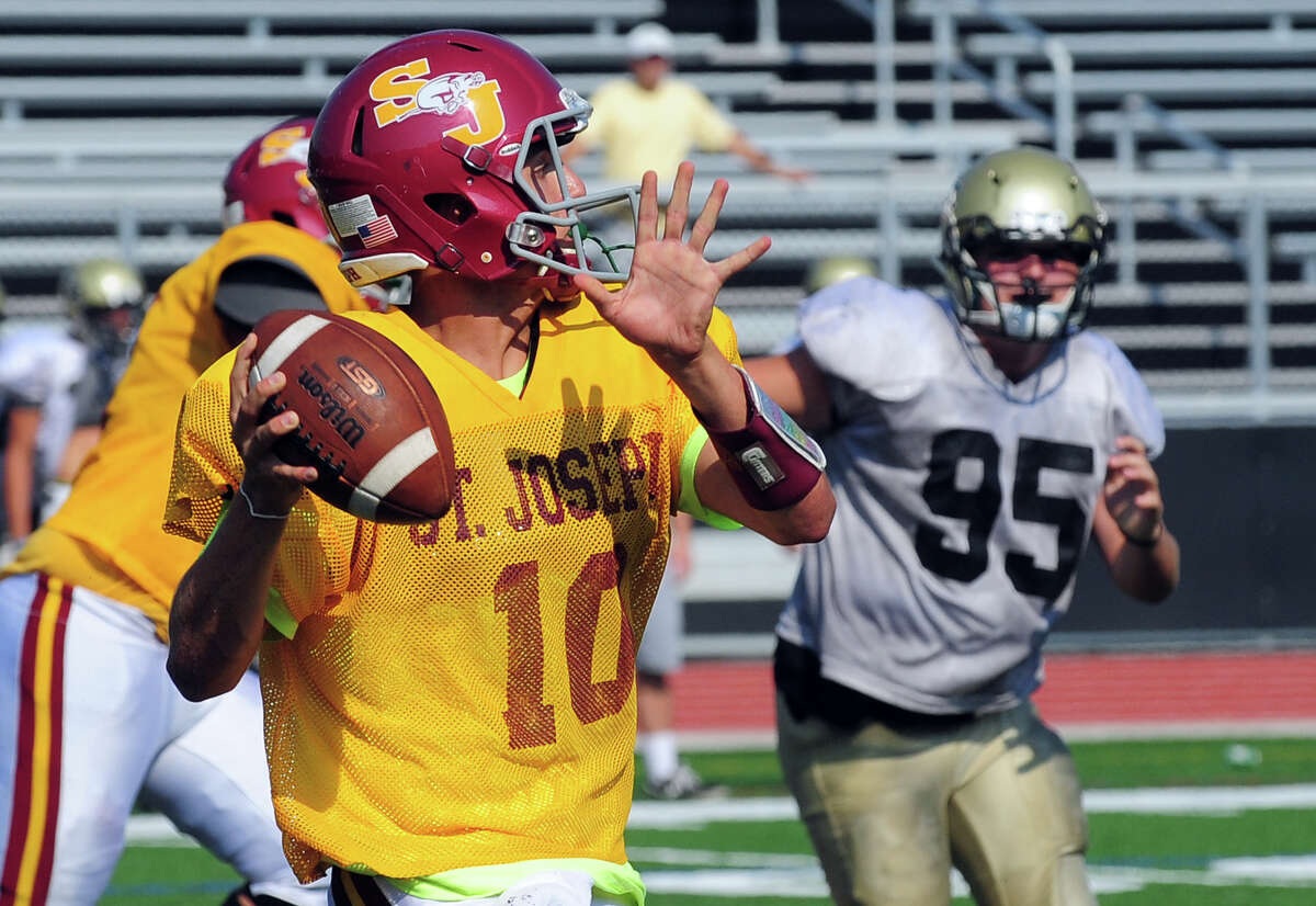 St. Joseph's QB Kevin Trefz, during football scrimage action against Joel Barlow in Redding, Conn. on Wedesday August 27, 2014.