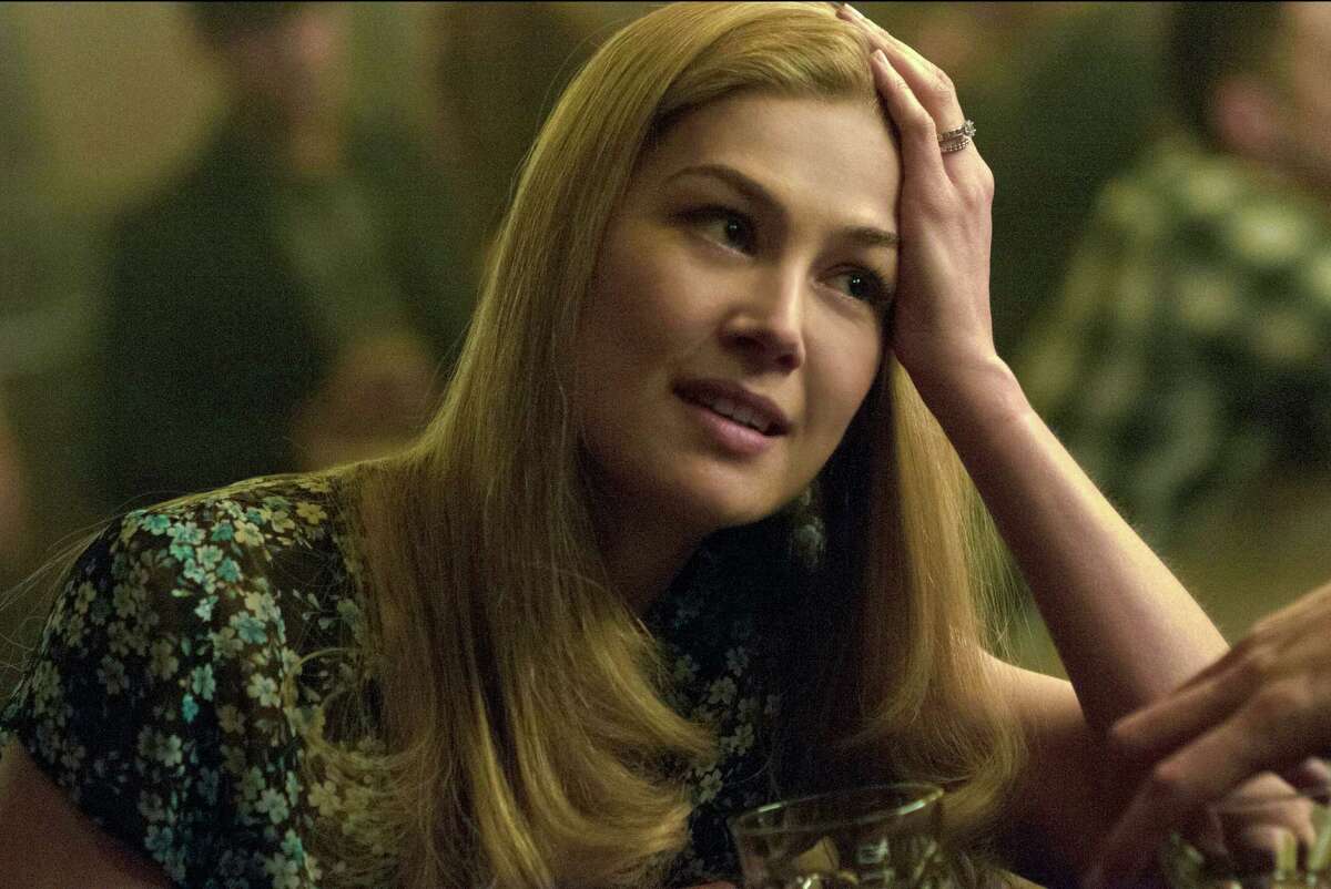 In this image released by 20th Century Fox, Rosamund Pike appears in a scene from "Gone Girl." The film, based on the best-selling novel, will release on Oct. 3. (AP Photo/20th Century Fox, Merrick Morton)