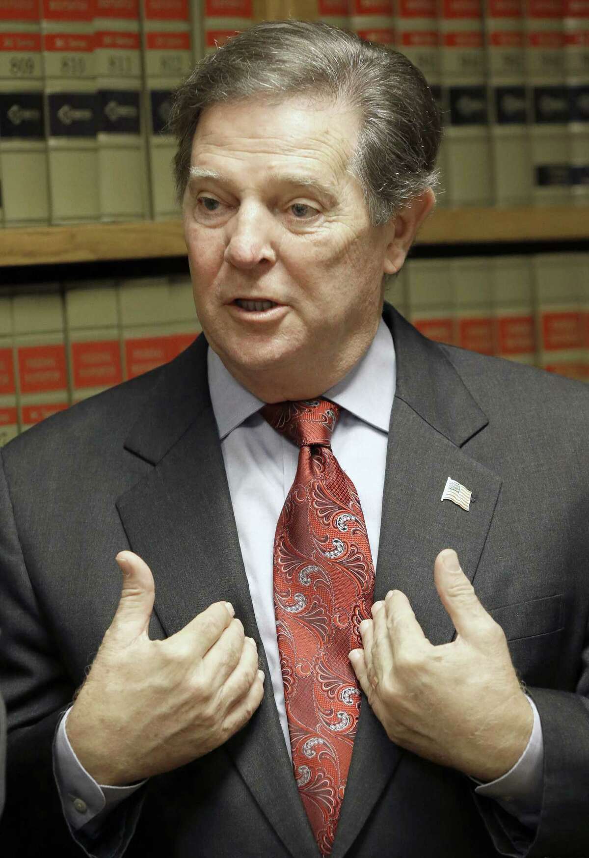 Former U.S. House Majority Leader Tom DeLay speaks with the news media in Houston after the highest criminal court in Texas refused to reinstate two money-laundering convictions against him.