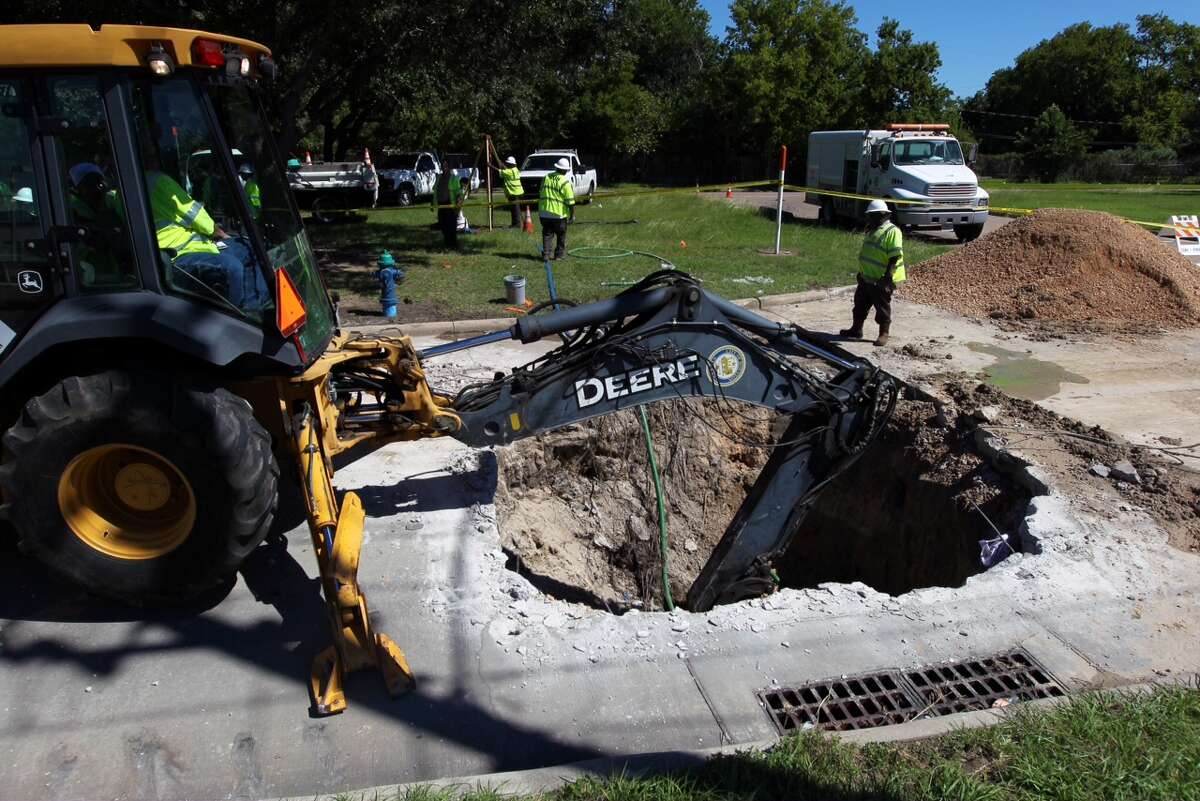 Heavy rains cause cavein on Houston road