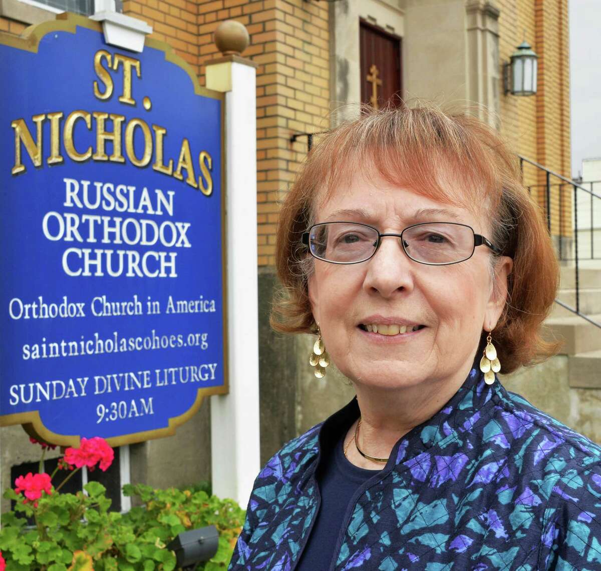 Life-long parisher Stephanie Stroyen of Stoughton, Mass. and Cohoes outside St. Nicholas Orthodox Church Thursday Oct. 2, 2014, in Cohoes, NY. (John Carl D'Annibale / Times Union)