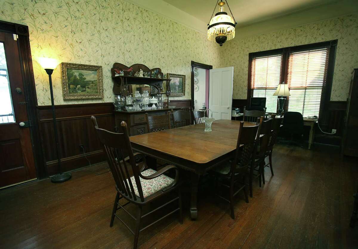 The dining table in the historic home of Mary Jane and Wayne Windle in Seguin has a history of its own, having served as an operating table when Wayne Windle's great-great-grandfather suffered a badly broken leg.