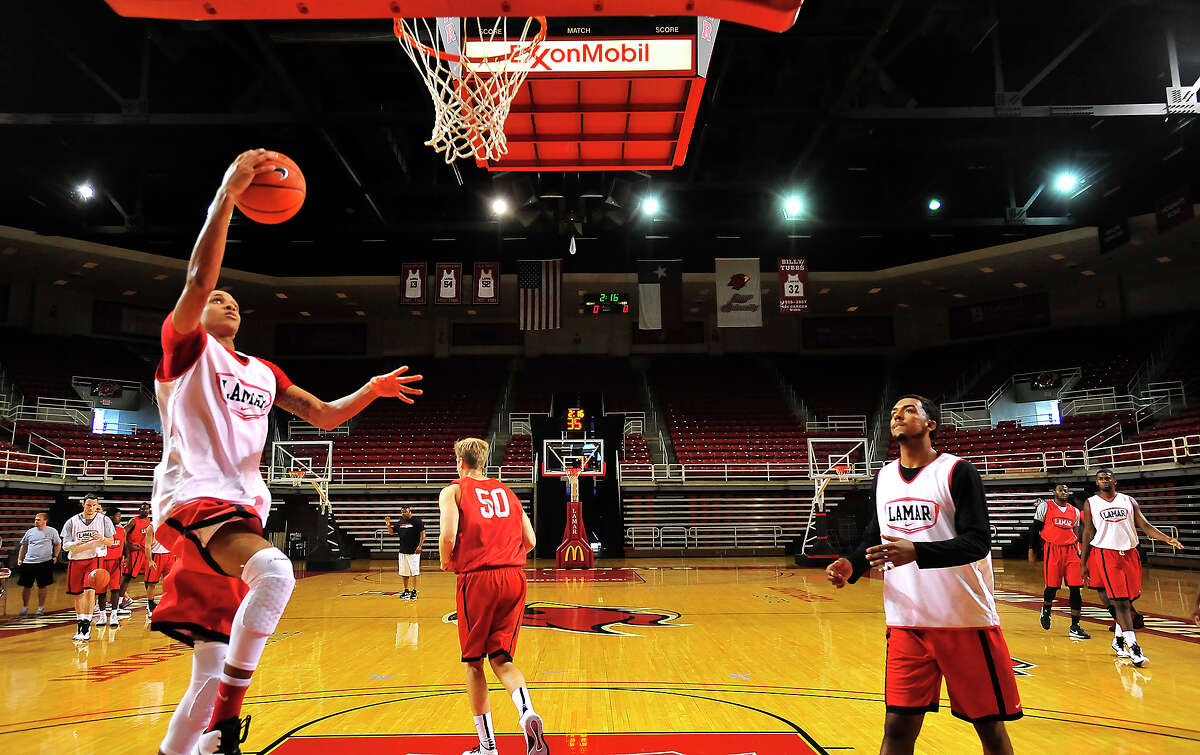 Lamar University's men's basketball team run a series of shooting and passing drills on the opening day of practice Friday in the Montagne Center. Photo taken Friday, October 3, 2014 Kim Brent/@kimbpix