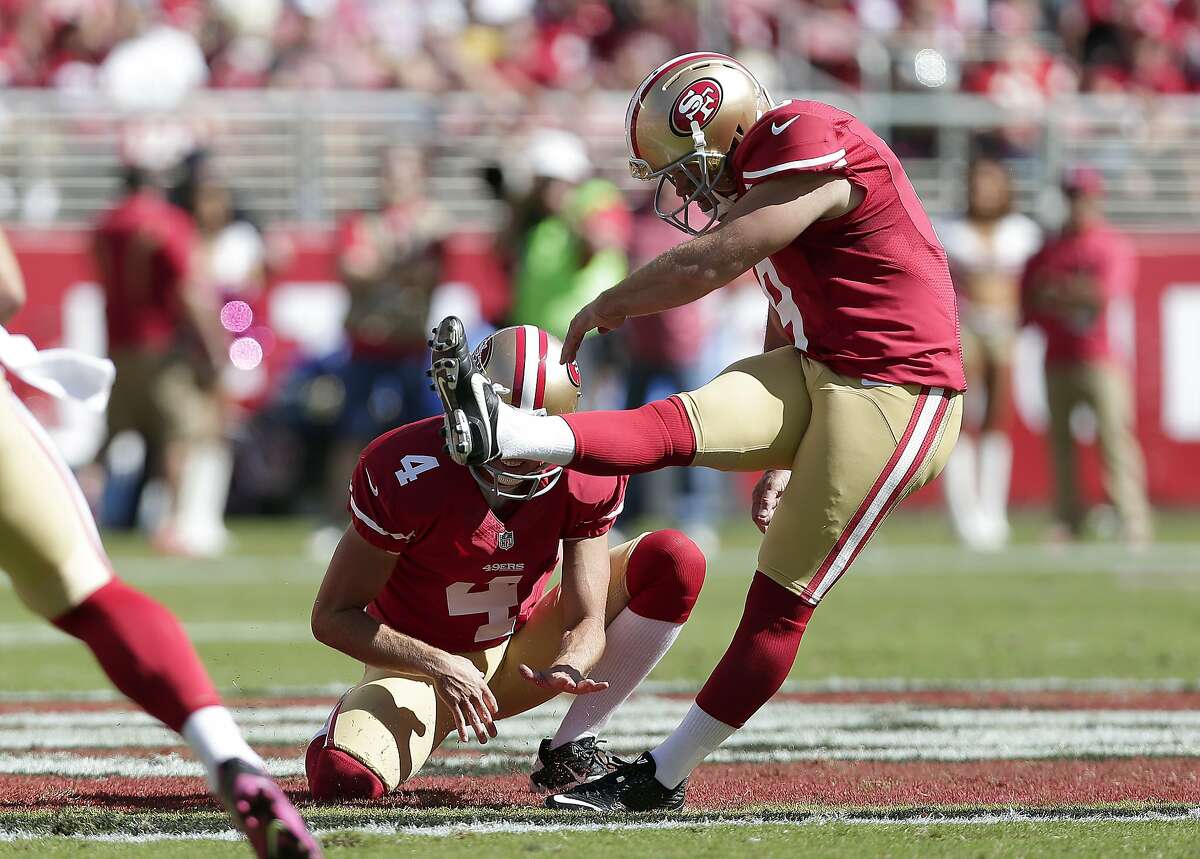 San Francisco 49ers kicker Phil Dawson (9) kicks a 55-yard field goal from the hold of Andy Lee during the second quarter of an NFL football game against the Kansas City Chiefs in Santa Clara, Calif., Sunday, Oct. 5, 2014. (AP Photo/Marcio Jose Sanchez)