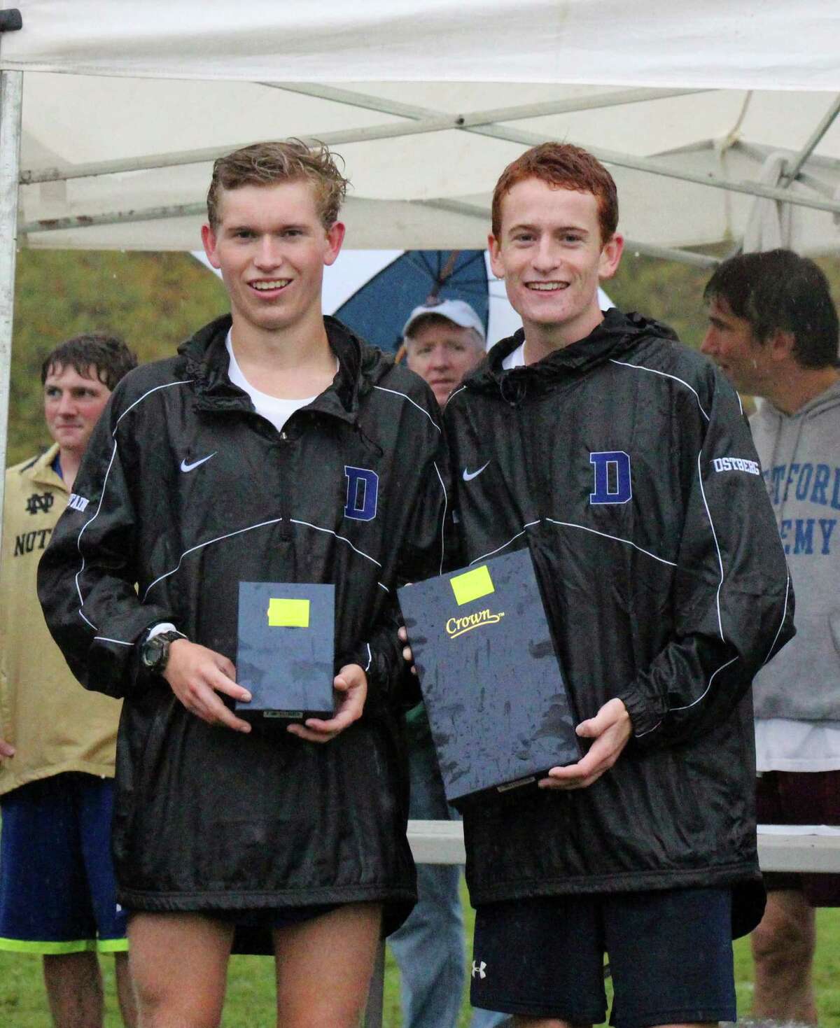 Darien's Alex Ostberg, right, and Armstrong Noonan, left, and pose after finishing first and second, respectively, at the Woods Trail Run at Thetford Academy in Thetford, V.T., on Saturday, Oct. 4.