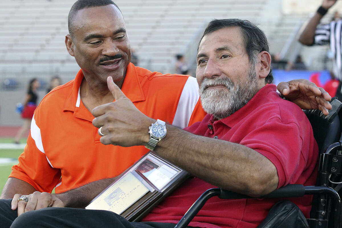 Gary Green (left) and Gabe Rivera are honored during a pre-game ceremony Sept. 27 as Sam Houston faces Jefferson at Alamo Stadium.