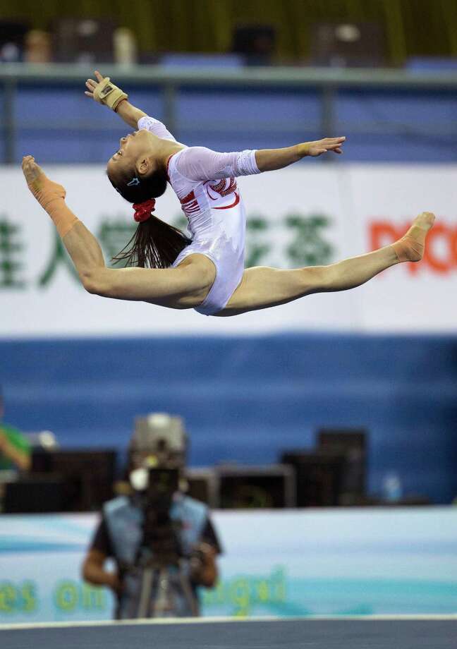 Women compete in China Gymnastics - Houston Chronicle