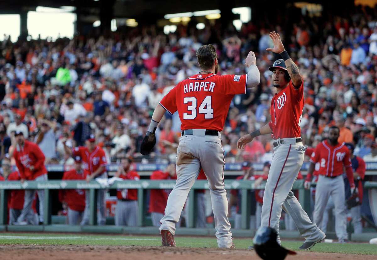 Washington Nationals left fielder Bryce Harper (34) warms up prior