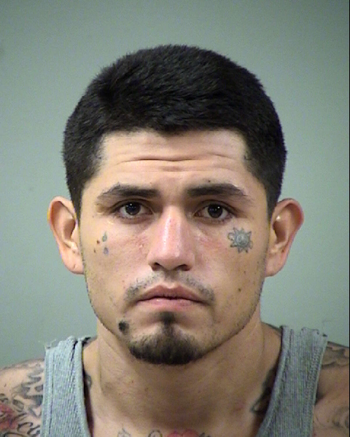 Daniel Lopez, 28, was arrested for murder Oct. 3, 2014 after police found a body wrapped in trash bags at his home.