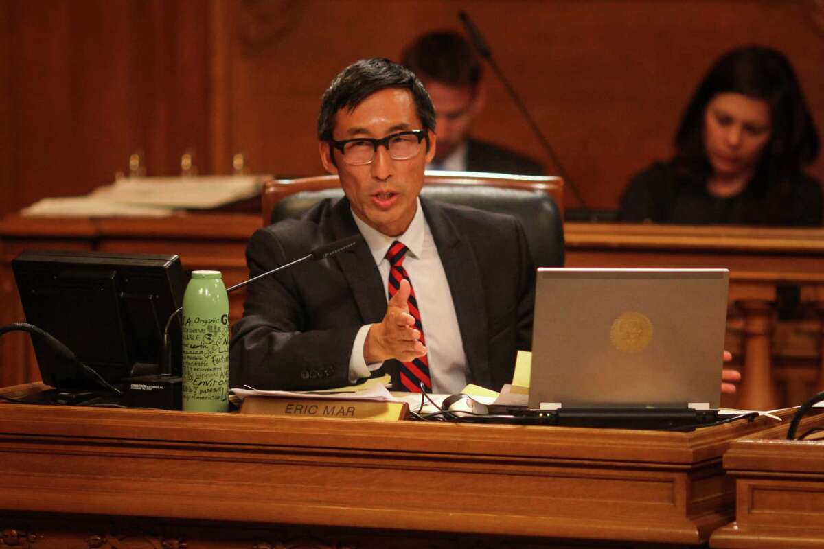 Eric Mar during a Board of Supervisors meeting in 2014. Click through the gallery for San Francisco crime statistics.