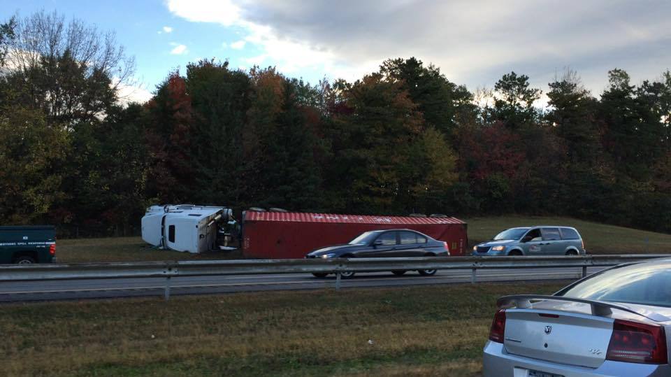 Tractor trailer topples on I-90