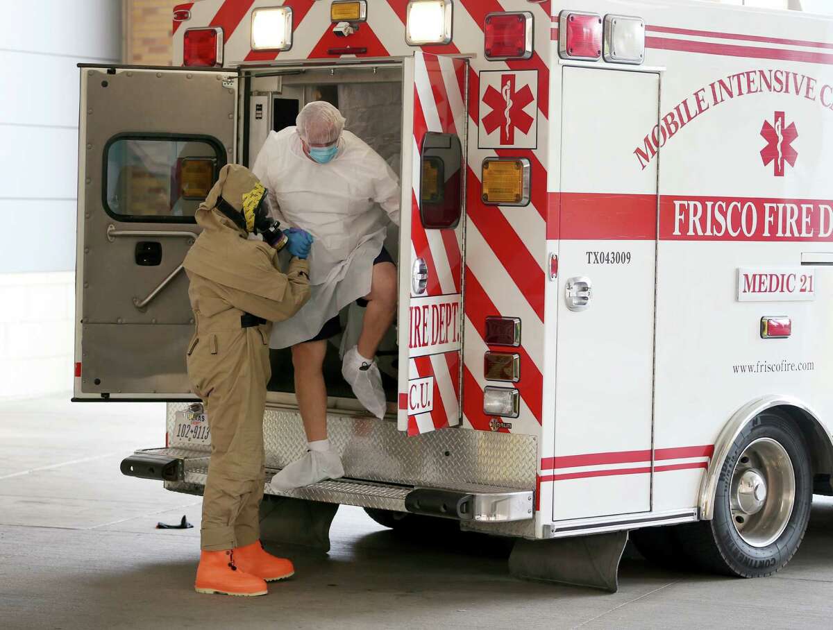 DALLAS, TX - OCTOBER 08: A possible Ebola patient is brought to the Texas Health Presbyterian Hospital on October 8, 2014 in Dallas, Texas. Thomas Eric Duncan, the first confirmed Ebola virus patient in the U.S., died earlier today.