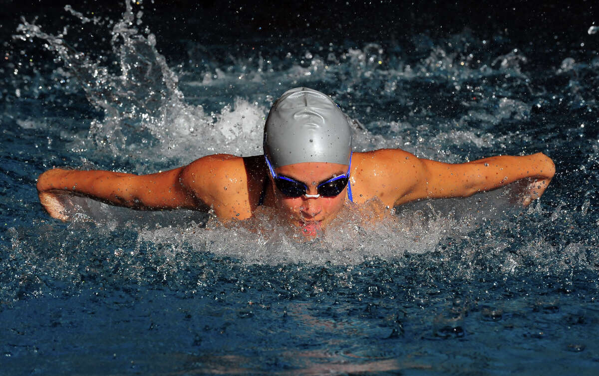 Fairfield Ludlowe's Maxine Hebert competes in the 200 meter medley relay, during swim meet action against Fairfield Warde at Fairfield University in Fairfield, Conn. on Wednesday October 8, 2014.