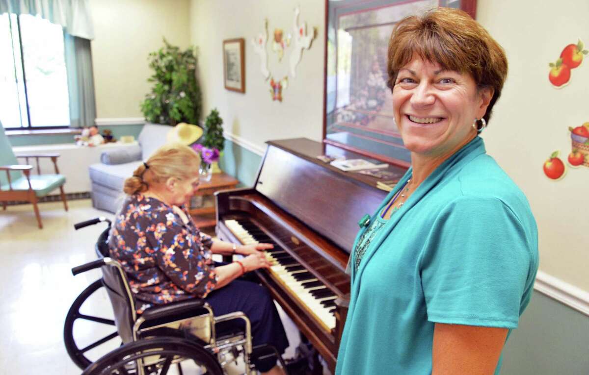 Capital Region Gives Piano tickles nursing home residents