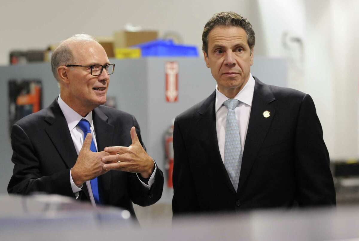 Plug Power CEO Andy Marsh, left, gives Gov. Andrew Cuomo a factory tour Wednesday, Oct. 8, 2014, at Plug Power in Colonie, N.Y., where the governor was endorsed by the state Business Council. (Will Waldron/Times Union)