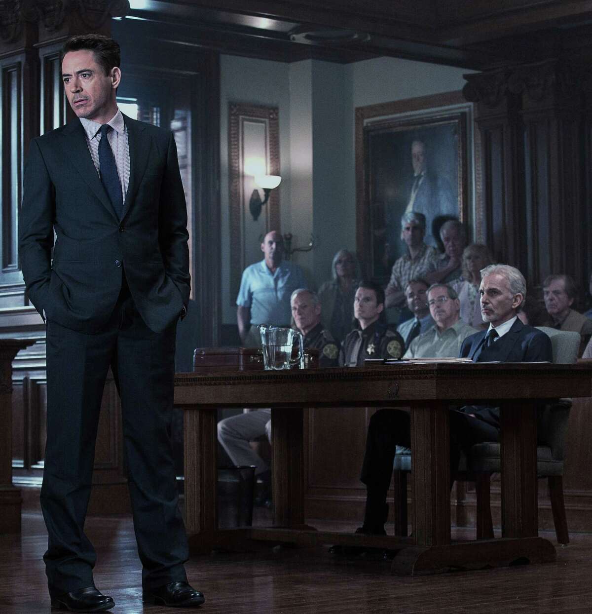 This photo released by Warner Bros. pictures shows, Robert Downey Jr., left, as Hank Palmer and Billy Bob Thornton, right, as Dwight Dickham in Warner Bros. Pictures' and Village Roadshow Pictures' drama "The Judge," a Warner Bros. Pictures release. The movie releases in the U.S. on Friday, Oct. 10, 2014. (AP Photo/Warner Bros. Pictures, Claire Folger) ORG XMIT: CAET931