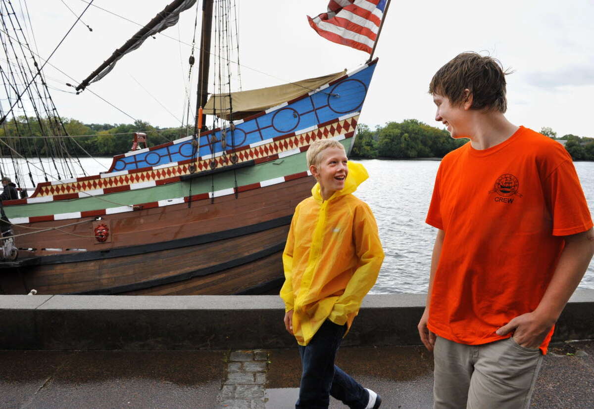 Ethan Radley, 12, left, of Rensselaer and Benjamin Krijnsen, 14, of Heerenveen, The Netherlands recount their voyage along with other Dutch and American middle school students aboard the replica 17th century sailing ship Half Moon at Albany's Corning Preserve Tuesday Sept. 18, 2012, after they re-created the original voyage of Henry Hudson from September 1609. (John Carl D'Annibale / Times Union)