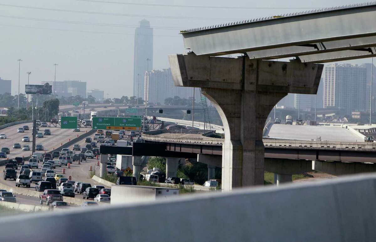 The new Loop 610 overpass connecting to Interstate 10 overlooks columns for related ongoing projects.