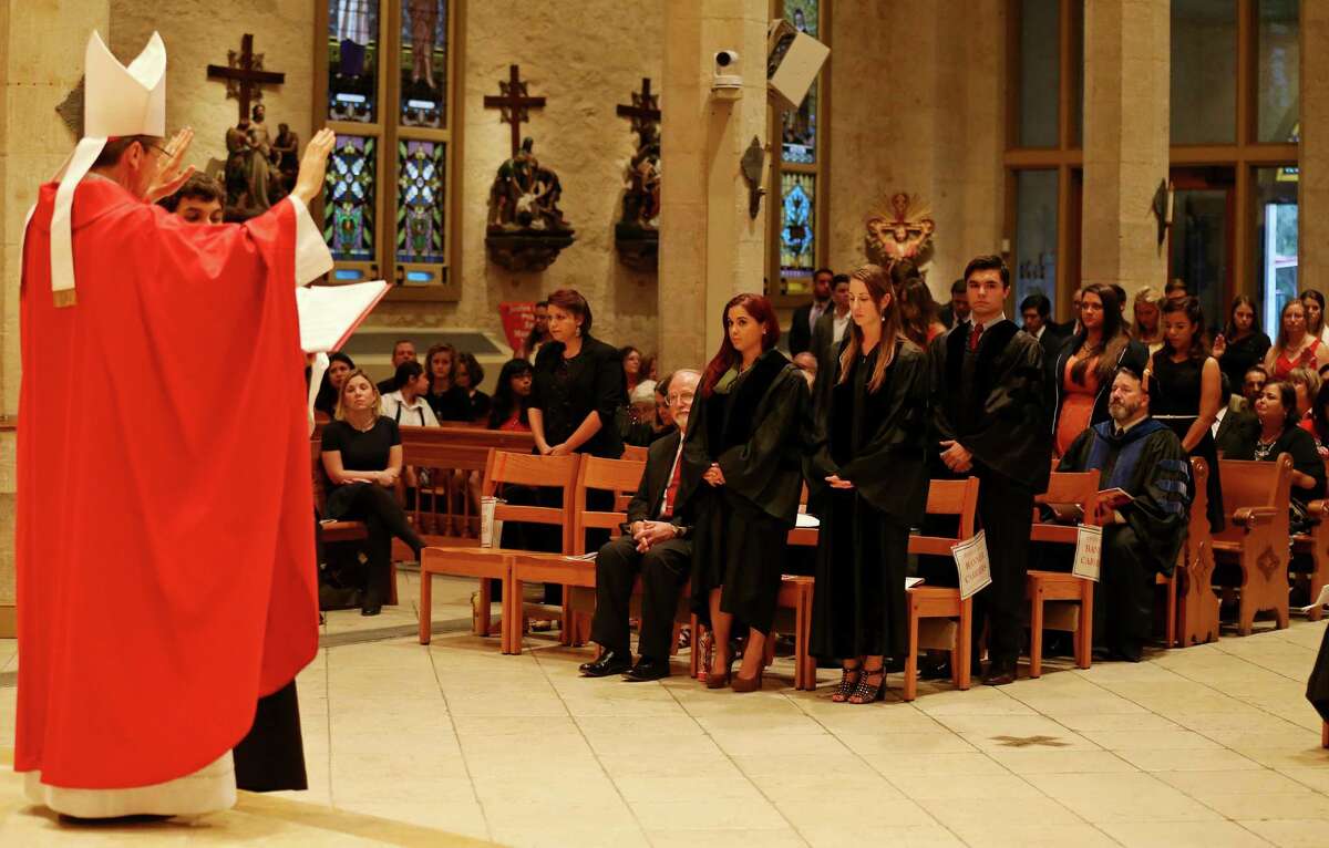 San Antonio Archbishop Gustavo Garcia-Siller (left) blesses members of the legal profession during the 62nd annual Red Mass held Thursday Oct. 9, 2014 at San Fernando Cathedral.