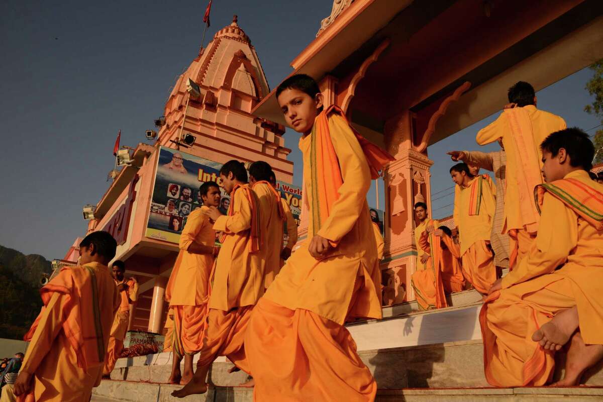 Residents of the ashram Parmarth Niketan hold Ganga Aarti ceremonies.