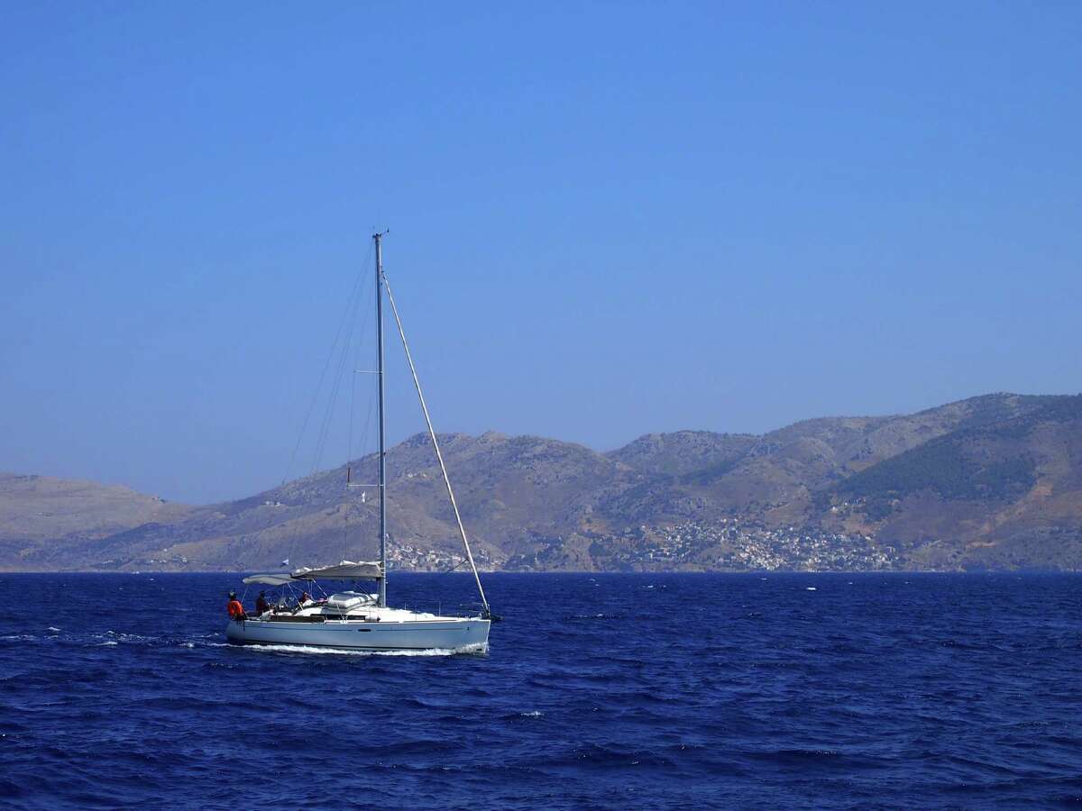 A boat en route from Poros to Spetses during a sailing trip around Greece s Peloponnesian Peninsula.