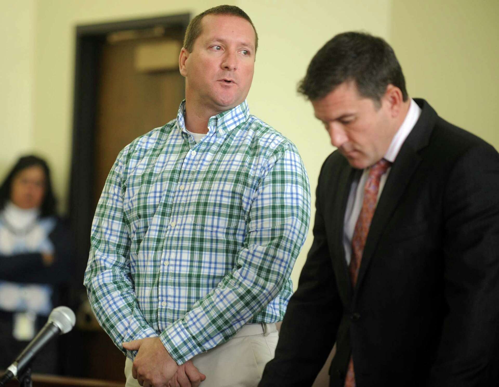 Ex-trooper gets 1 year for theft from dying motorist