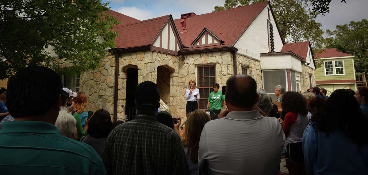 Democratic gubernatorial candidate Wendy Davis speaks during a community block walk with campaign supporters Saturday in San Antonio. She was speaking at the west side home of Alicia Hilton.