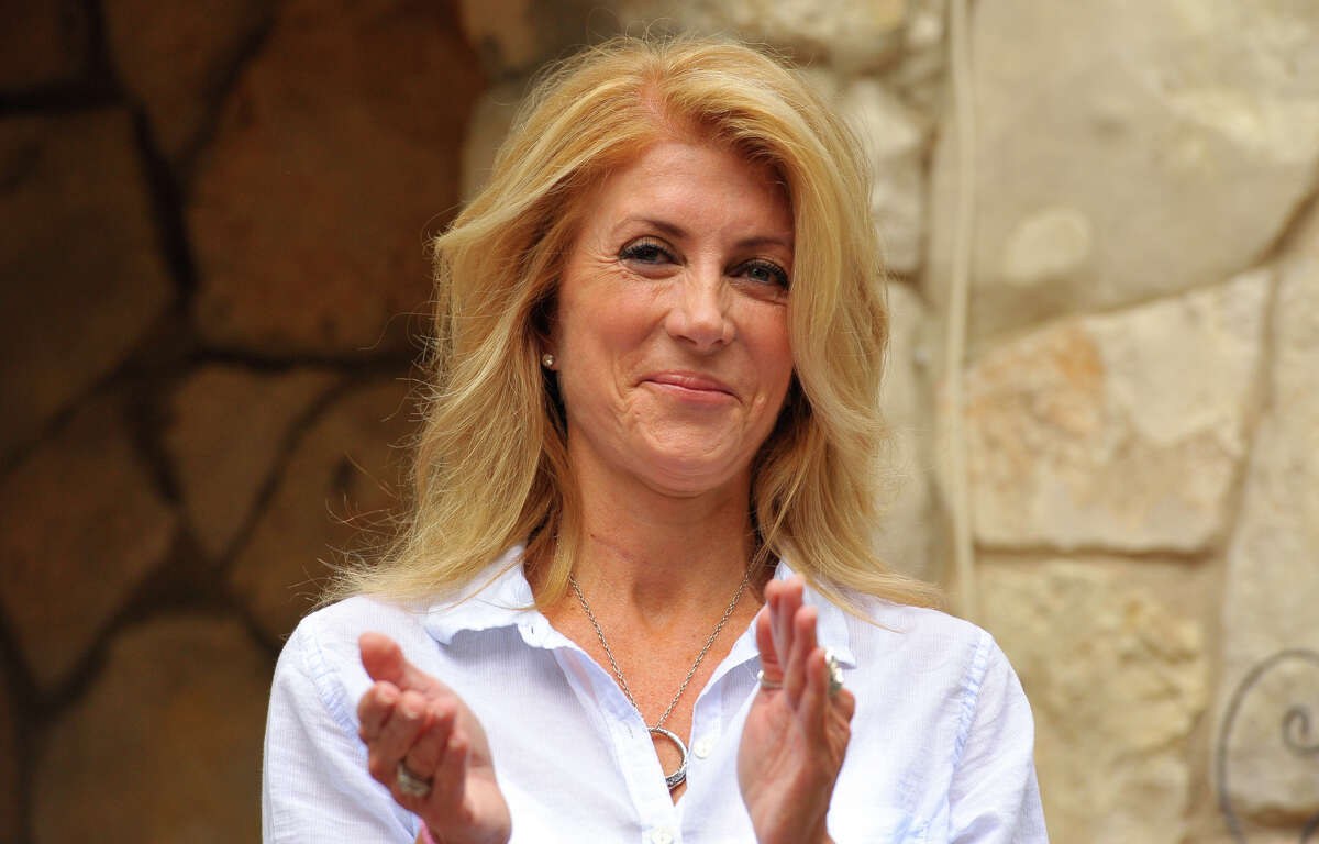 Democratic gubernatorial candidate Wendy Davis smiles after giving remarks during a community block walk with campaign supporters Saturday in San Antonio.