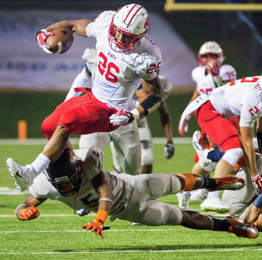 henderson (5) during the first half of a high school football