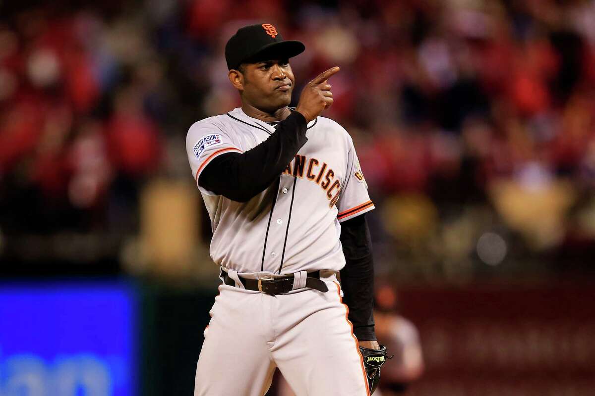 ST LOUIS, MO - OCTOBER 11: Santiago Casilla #46 of the San Francisco Giants reacts in the ninth inning against the St. Louis Cardinals during Game One of the National League Championship Series at Busch Stadium on October 11, 2014 in St Louis, Missouri. (Photo by Jamie Squire/Getty Images)