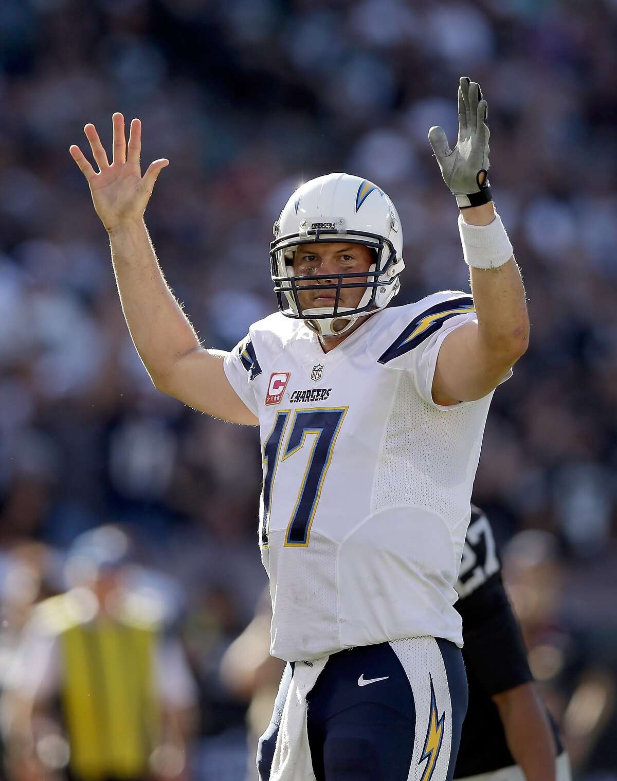 OAKLAND, CA - OCTOBER 12: Philip Rivers #17 of the San Diego Chargers reacts after the Chargers scored a touchdown to take the lead over the Oakland Raiders in the fourth quarter at O.co Coliseum on October 12, 2014 in Oakland, California. (Photo by Ezra Shaw/Getty Images)
