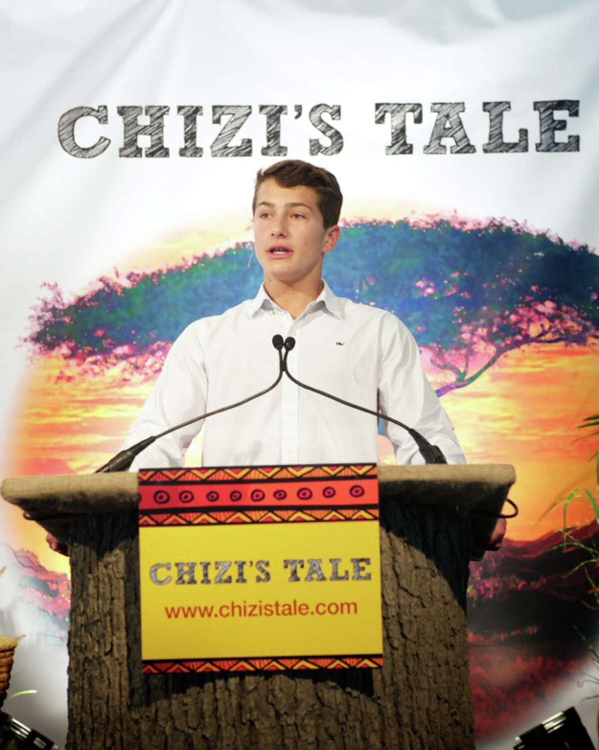 Greenwich's Jack Jones recently published his first children's book, "Chizi's Tale," which tells a true tale of a family's decision to keep an abandoned black rhino in their home. Here, he talks about the project at a book launch in September 2014.