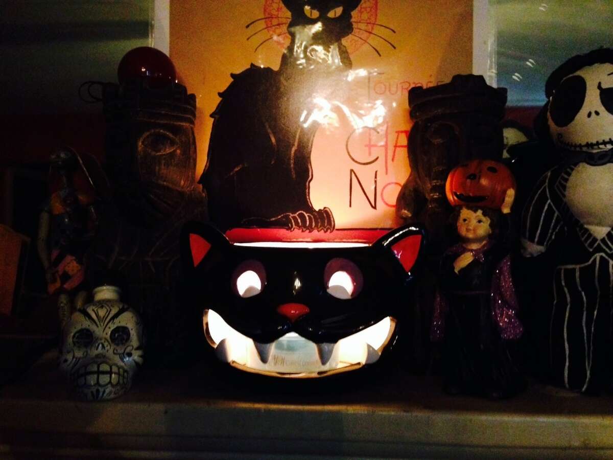 Our creepy Halloween mantle.