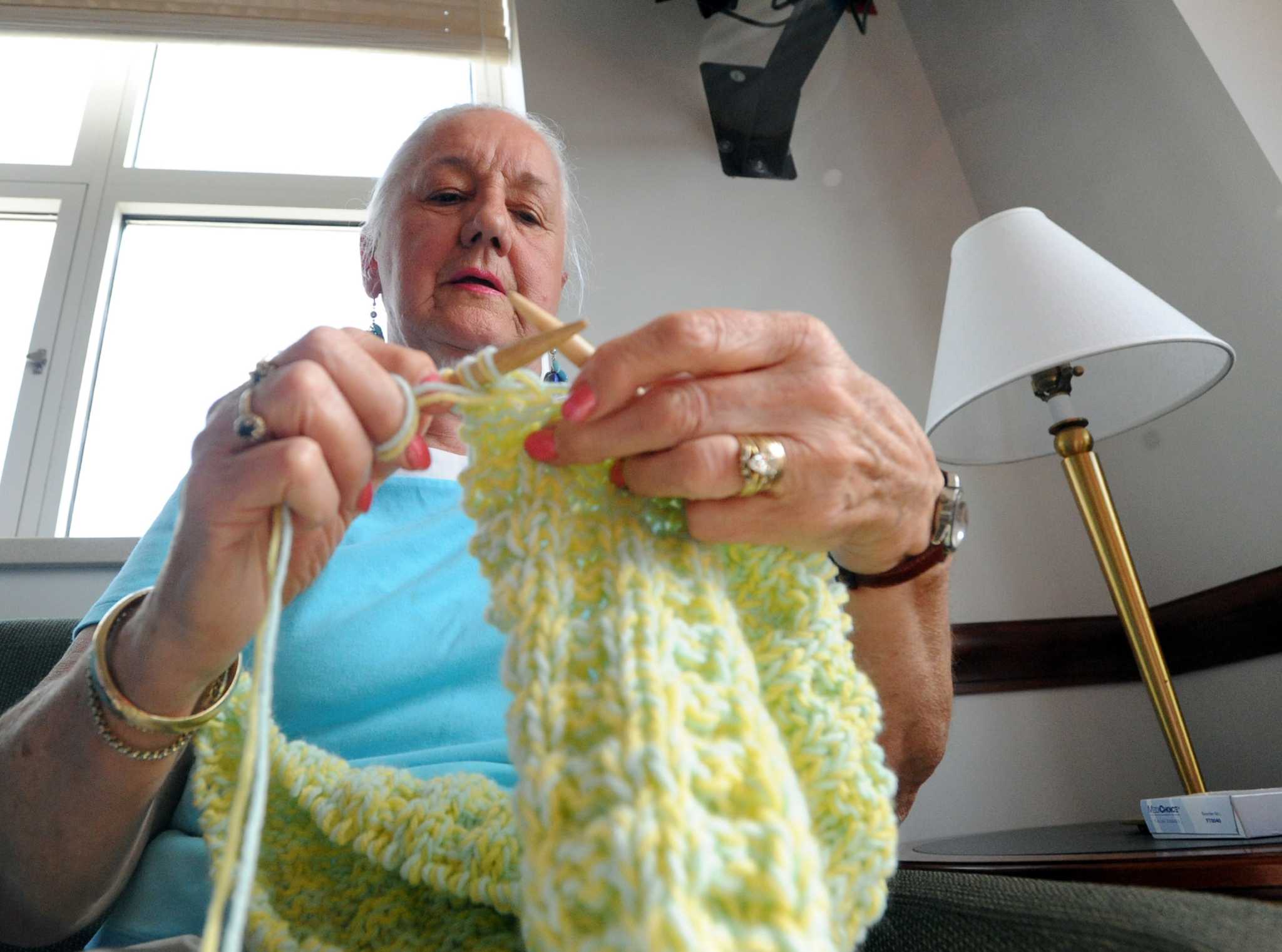 Tightly knit group makes shawls for cancer patients