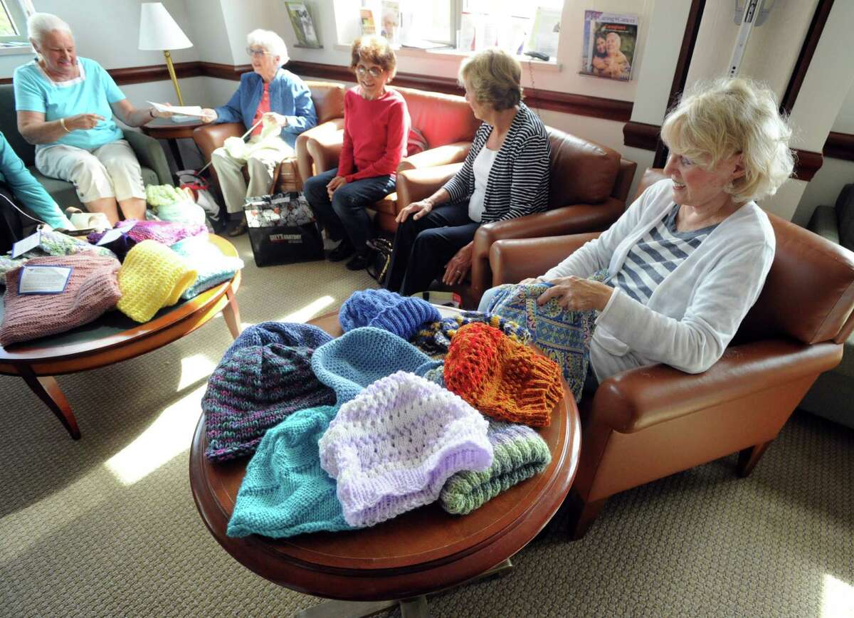 Tightly knit group makes shawls for cancer patients