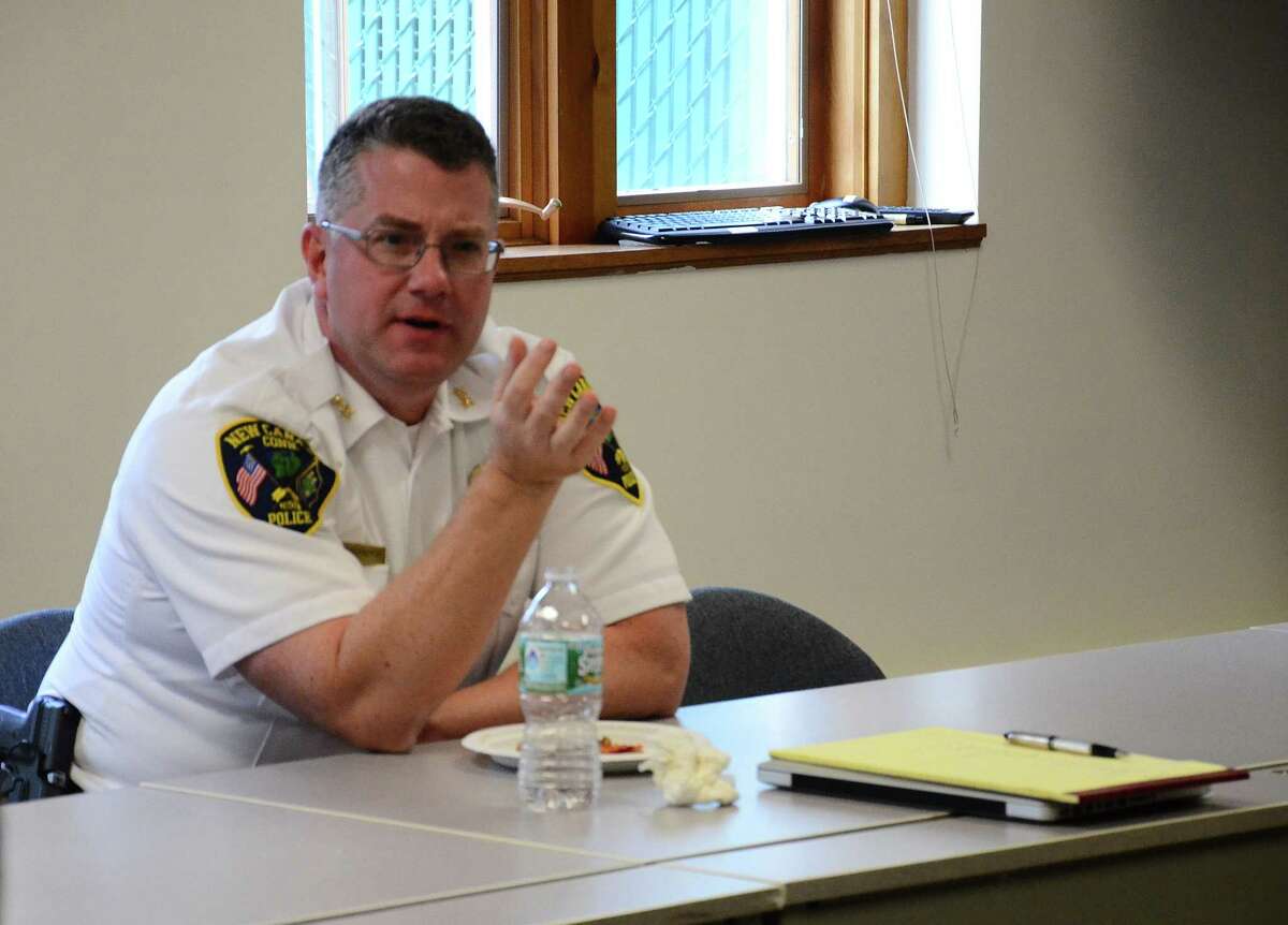 Police Chief Leon Krolikowski met a group of New Canaan, Conn., residents for pizza and an informal discussion Tuesday, Oct. 14, 2014.