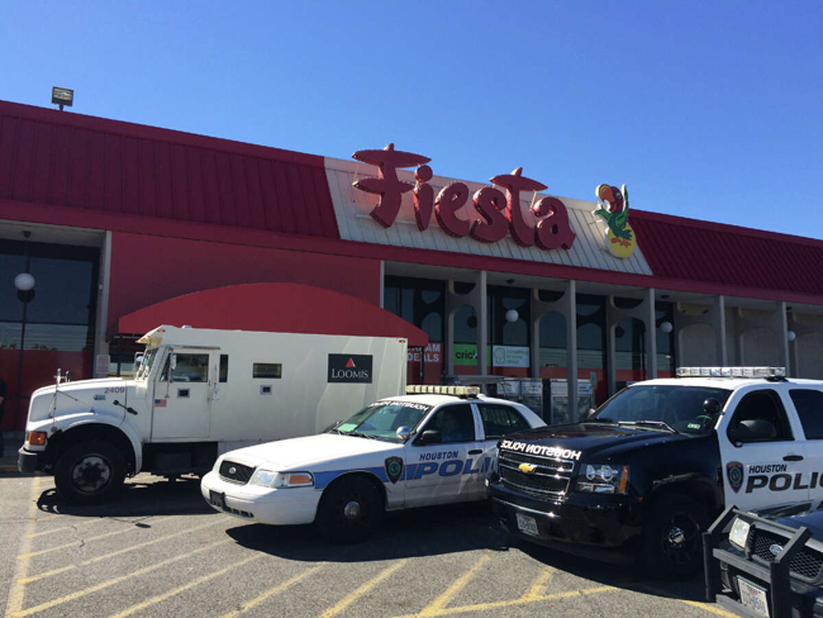 Authorities are investing the robbery Wednesday morning of an armored car in front of a Fiesta grocery store on Bellfort near Telephone in Houston.